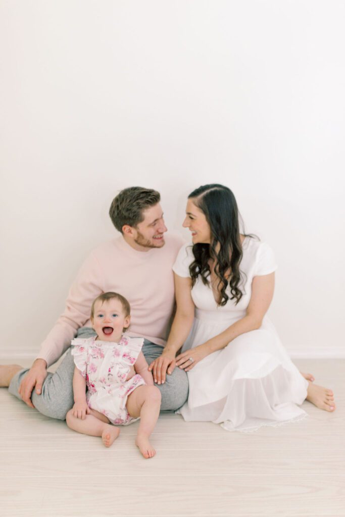 couple and daughter in professional family photoshoot